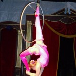 Solo Air gymnast on a hoop
